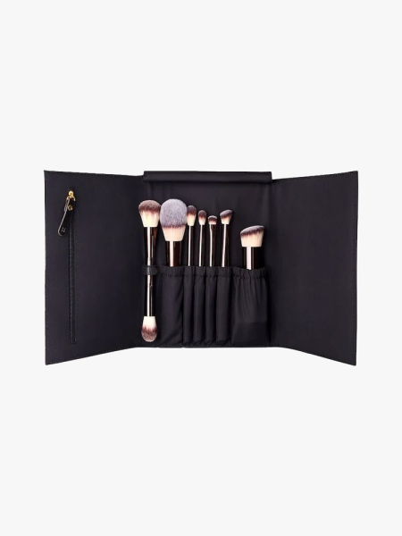 Hourglass Vegan Brush Travel Set in branded components on a light gray background